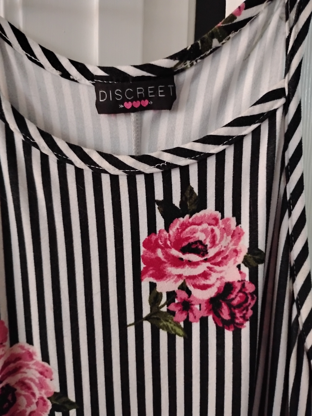 Discreet Black & White Striped Dress with Pink Floral Accents